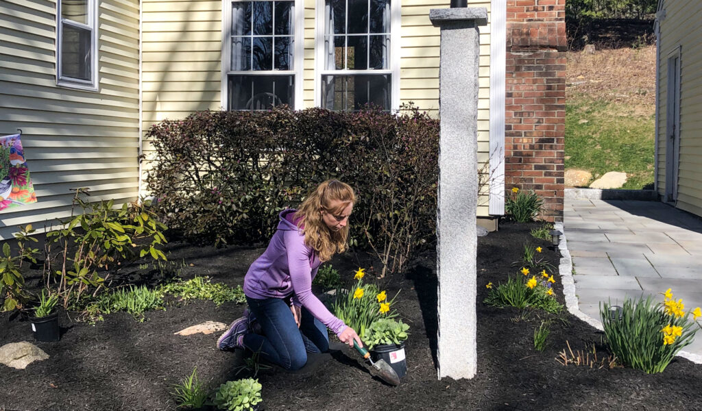 Granite Posts and cobblestone edging